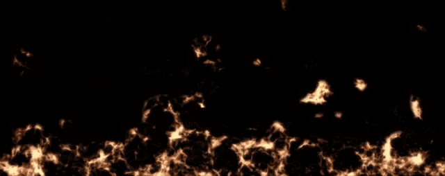 a black background with a bunch of orange spots on it