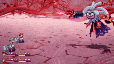 a video game shows mario and luigi fighting a giant monster