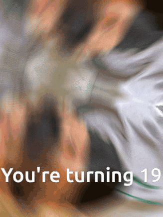 a blurry picture of a person with the words you 're turning 13