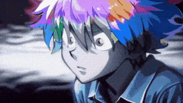 a close up of a cartoon character with rainbow hair