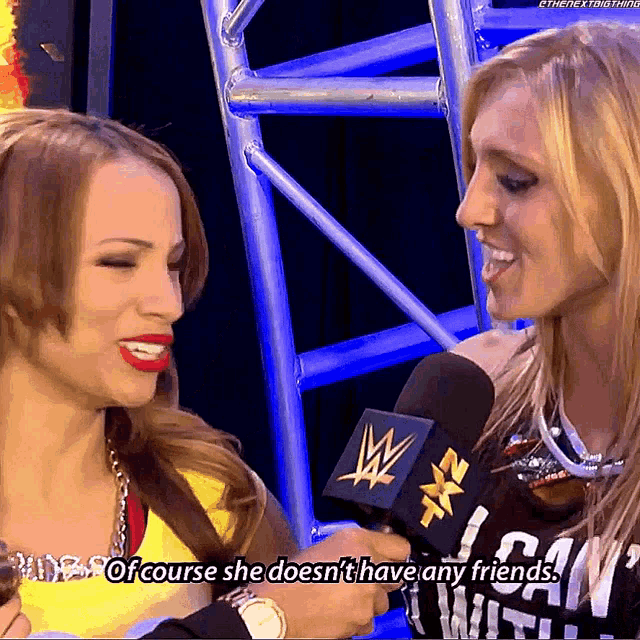 a woman talking into a microphone with the words of course she does n't have any friends below her