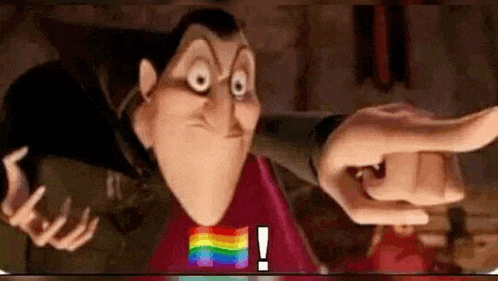a cartoon vampire is pointing at something with his finger .