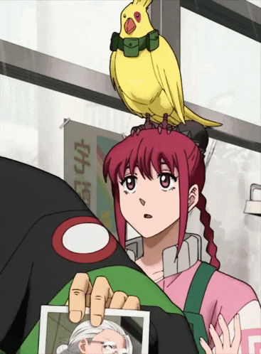 a girl with red hair and a yellow parrot on her head looks at a picture