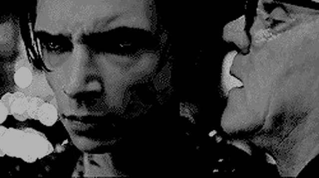 a black and white photo of two men talking to each other . one of the men is wearing glasses .