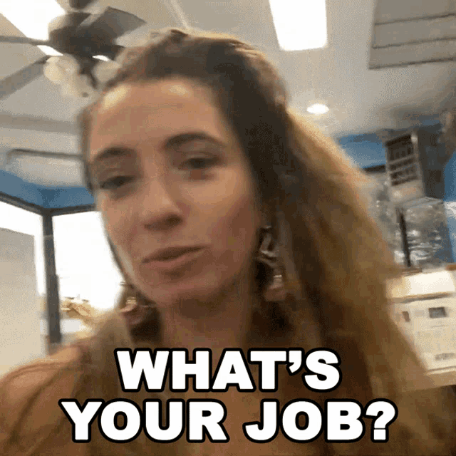 a woman says what 's your job while looking at the camera