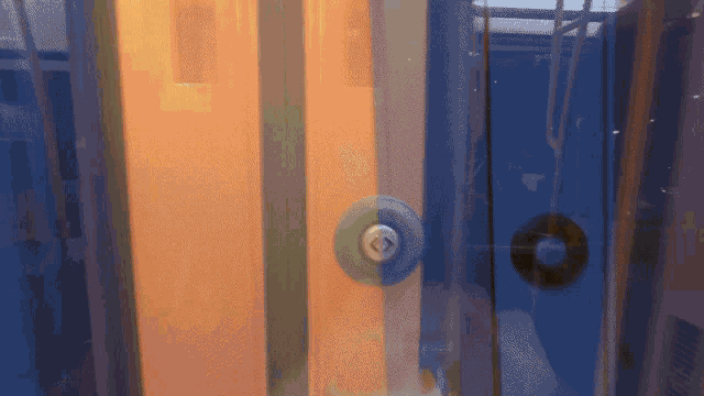 a close up of a door with a key on it that says ' a ' on it