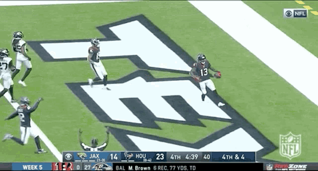 a nfl game is being played on a television screen
