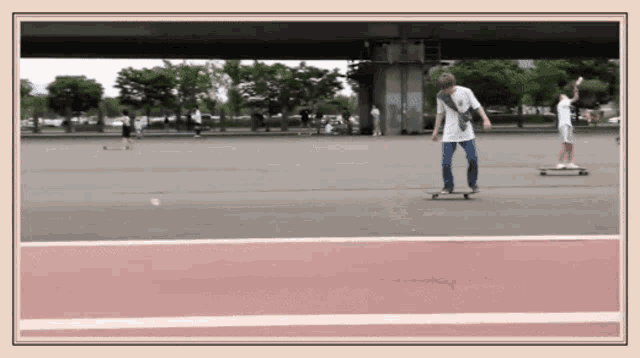a man is riding a skateboard on a road