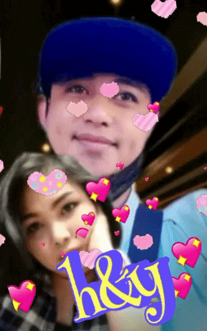 a man and a woman are surrounded by hearts and the words hey