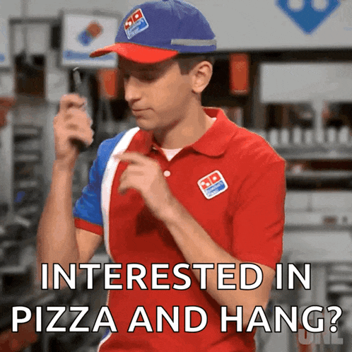 a man in a domino 's uniform is talking on a walkie talkie and says interested in pizza and hang