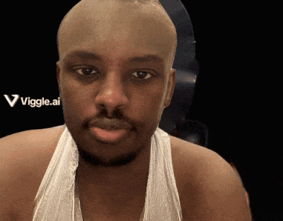 a bald man with a beard is wearing a white tank top and has a viggle.ai logo in the background