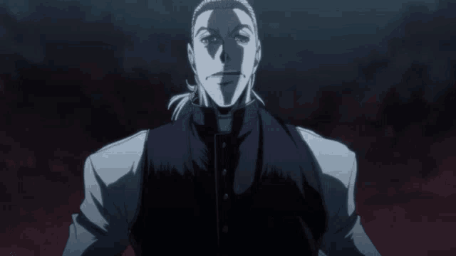 a man with a ponytail is wearing a priest 's vest