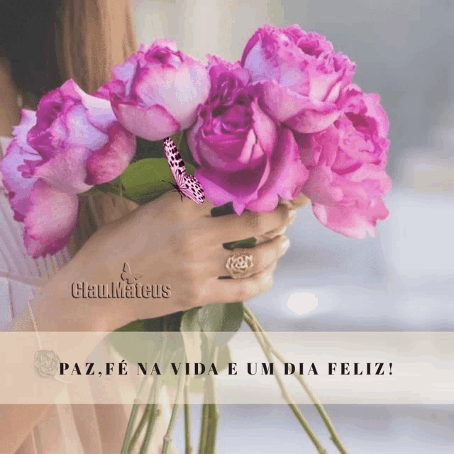 a woman is holding a bouquet of pink roses with a butterfly on it and the words paz fe na vida e um dia feliz