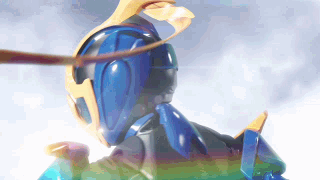 a close up of a toy robot with a blue helmet
