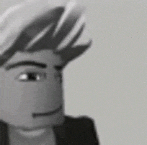 a black and white photo of a cartoon character 's face with a hat on .