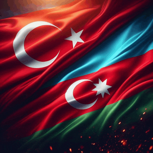 two flags with a crescent moon and star on them