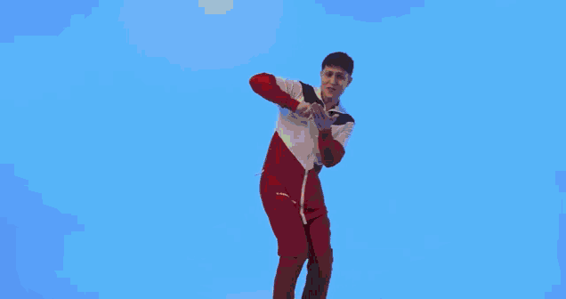 a man in a red white and black sweatshirt with the word russia on the front