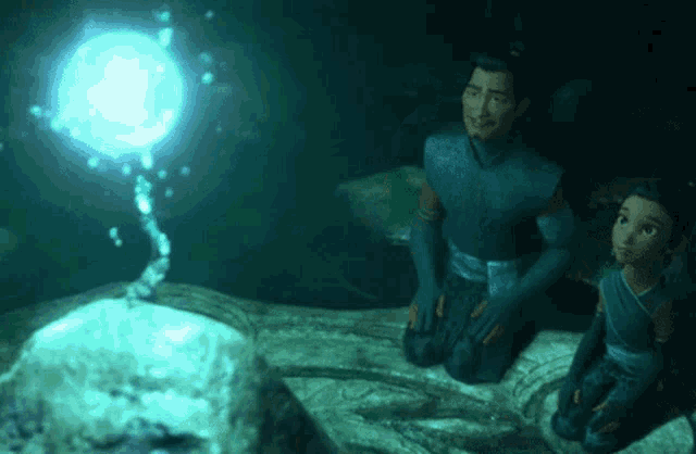 a man and a girl are looking at a glowing object in the water