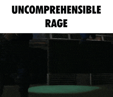 a man is laying on the ground with the words " uncomprehendible rage " written above him