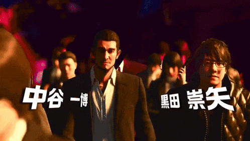 a man in a suit stands next to another man with chinese writing on his back