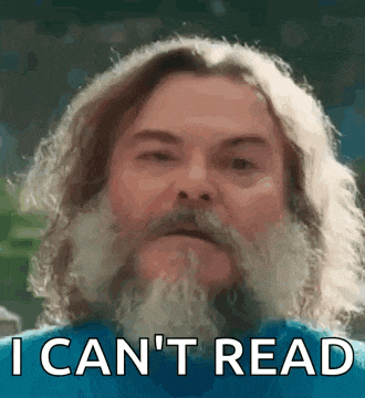 a man with long hair and a beard is saying i can 't read .
