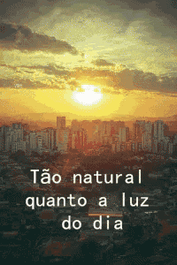 a sunset over a city with the words " tão natural quanto a luz do dia "