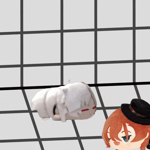 a stuffed animal with a red circle around it is laying on a checkered floor