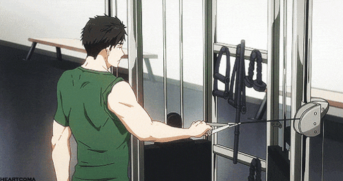 a man in a green shirt is using a machine with the word heartcoma on the bottom