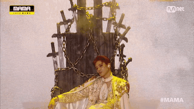 a man is sitting on a throne with chains around him and the words mama on the bottom right