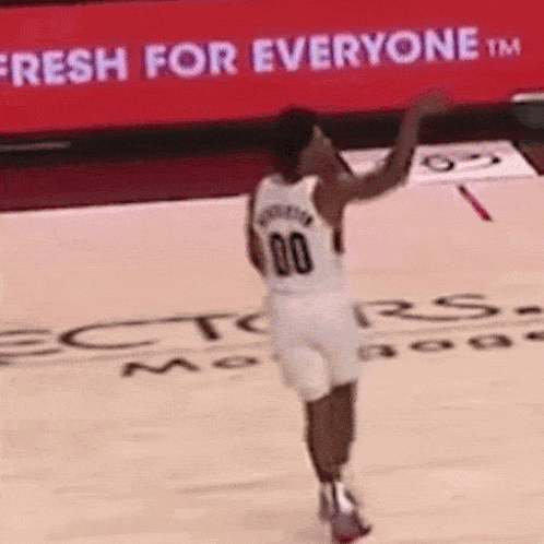 a basketball player with the number 00 on the back of his shirt