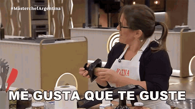 a woman with an apron that says magna on it