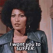 a woman in a leather jacket is saying i want you to suffer .