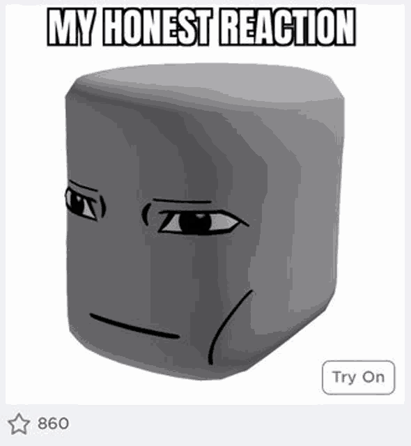 a gray cube with a face on it and the words `` my honest reaction '' .