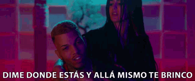 a man and a woman are standing next to each other with the words dime donde estas y alla mismo te brinco written below them
