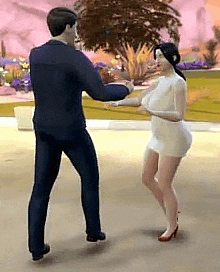 a man in a suit and a woman in a white dress are dancing in a video game .