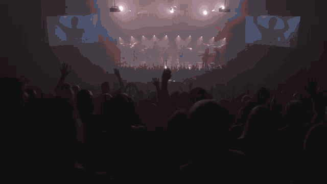 a drum set is lit up with a red light