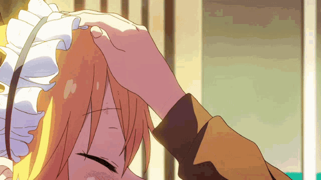 a person touching a girl 's head with a white headband