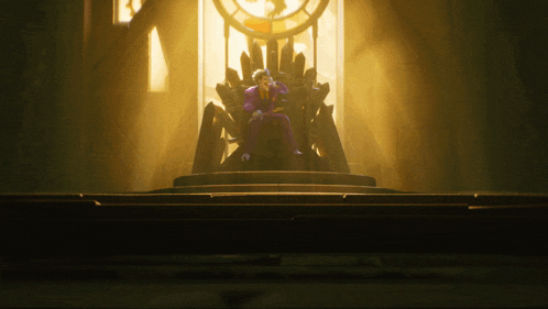 a man in a purple suit sits on a throne in front of a window