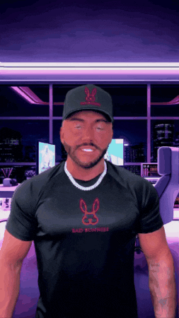 a man wearing a hat and a shirt that says bad business