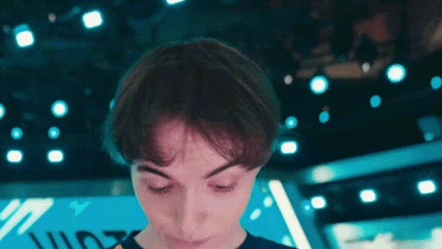 a close up of a person 's face with a blue background that says ' wilde '