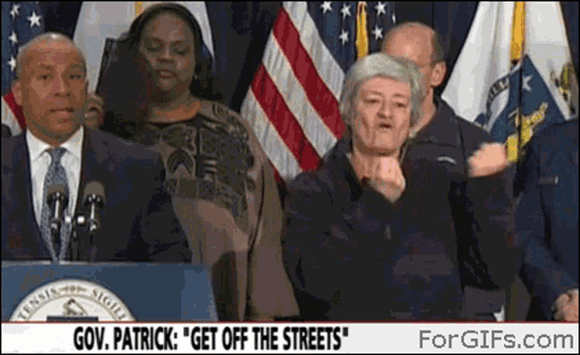 a group of people standing in front of a podium with the words gov. patrick " get off the streets " at the top