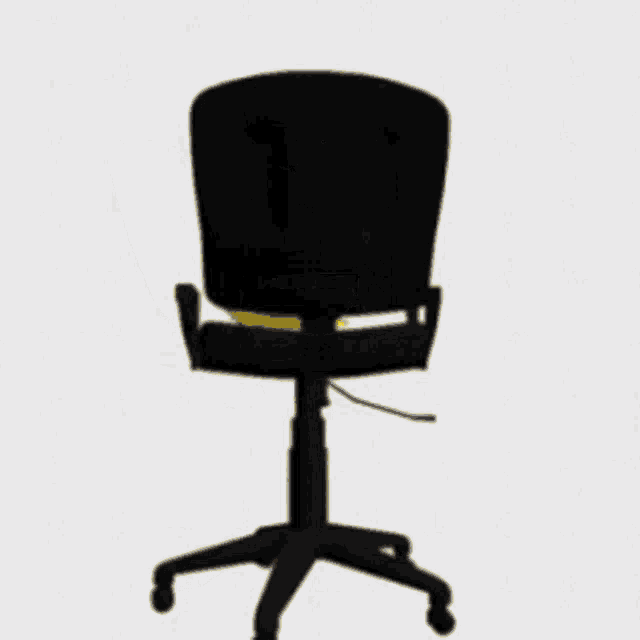 a yellow cartoon character is sitting on a black chair