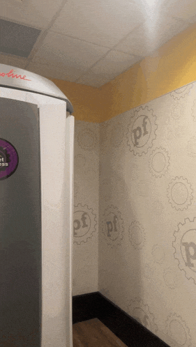 a room with a machine that says platinum on the side