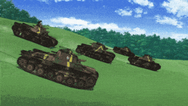 a group of military vehicles are driving down a grassy hill
