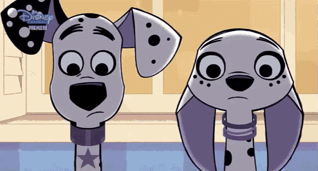 two dalmatian dogs standing next to each other with disney channel written on the bottom