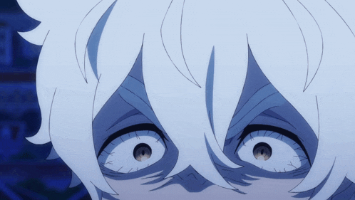 a close up of a person 's face with white hair and black eyes