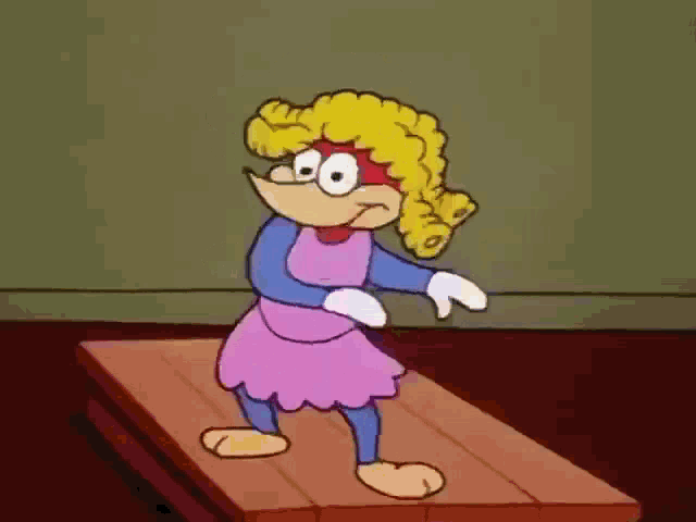 a cartoon character is standing on a wooden surface