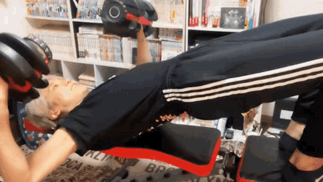 a man is lifting a dumbbell on a bench that says bpa on it