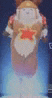 a blurred image of a statue of a rabbit with a red star on its chest .