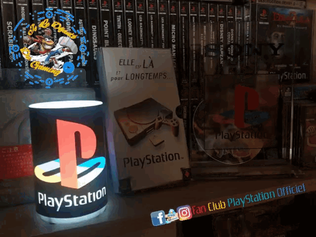 an advertisement for the playstation sits on a shelf with other games
